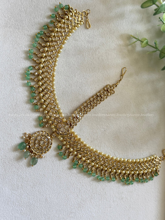 WHITE STONE FLORAL MATHAPATHI WITH PASTAL BEADS