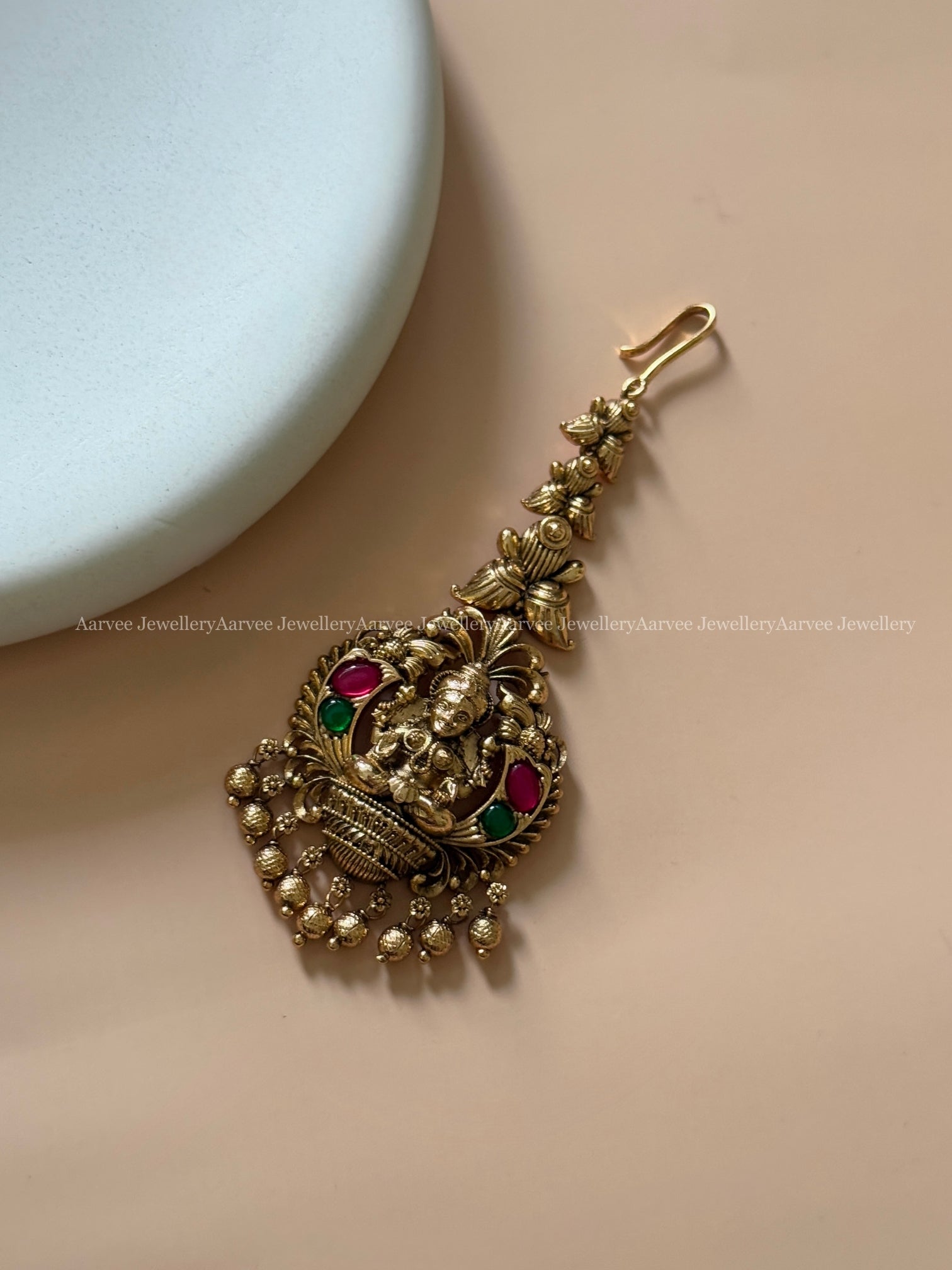 ANTIQUE GOLD LAKSHMI MOTIF TIKKA WITH GOLD BEADS