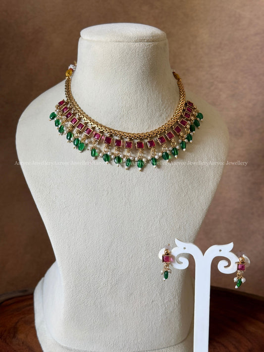 JALEBI SIMPLE NECKLACE SET WITH RUBY STONES & GREEN BEADS