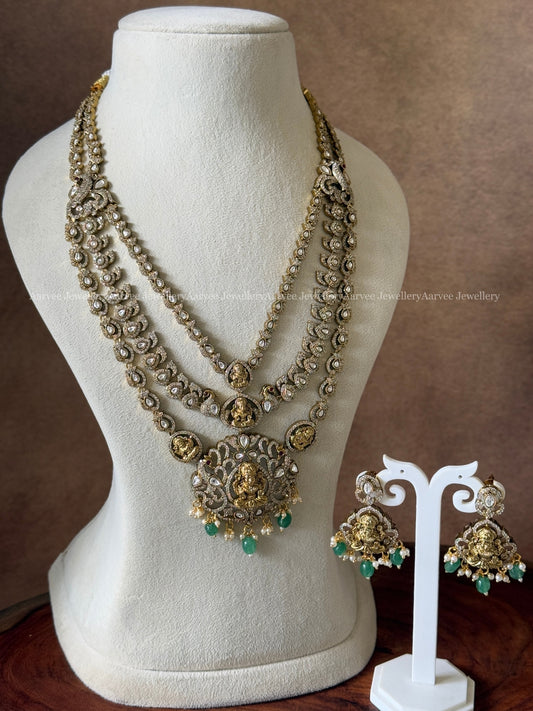 VICTORIAN WHITE STONE LAYERED MID LENGTH HARAM WITH LAKSHMI PENDANT AND PASTEL BEADS