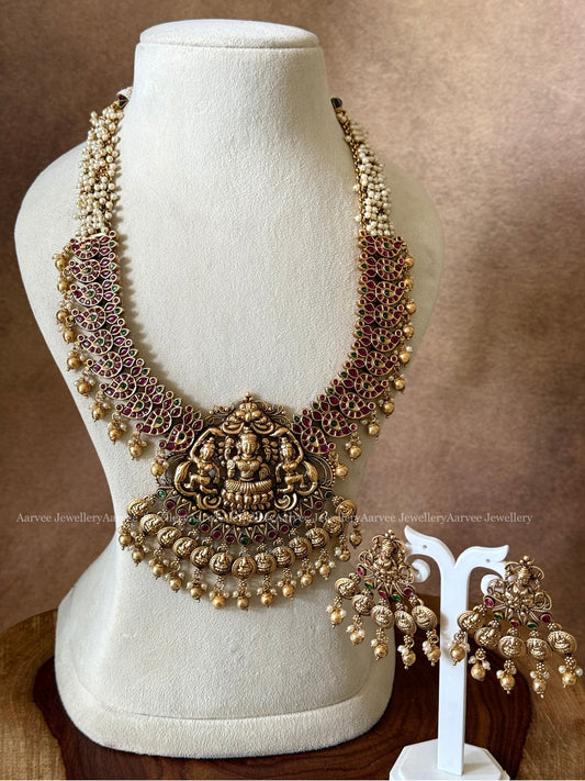 PEARL BUNCH MID LENGTH LAKSHMI PENDANT HARAM SET WITH RUBY / GREEN STONES