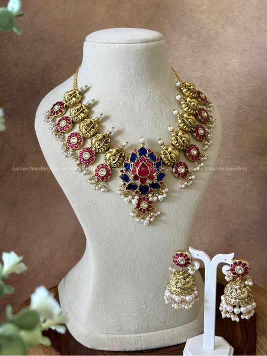 JADAU KUNDAN ANNAM & LOTUS PENDANT PINK AND BLUE STONE NECKLACE SET WITH JHUMKI
