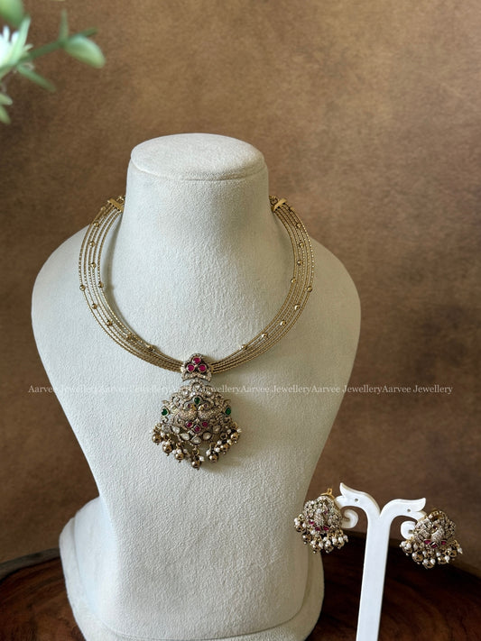 HASLI NECKLACE SET WITH VICTORIAN PEACOCK PENDANT AND RUBY / GREEN STONES