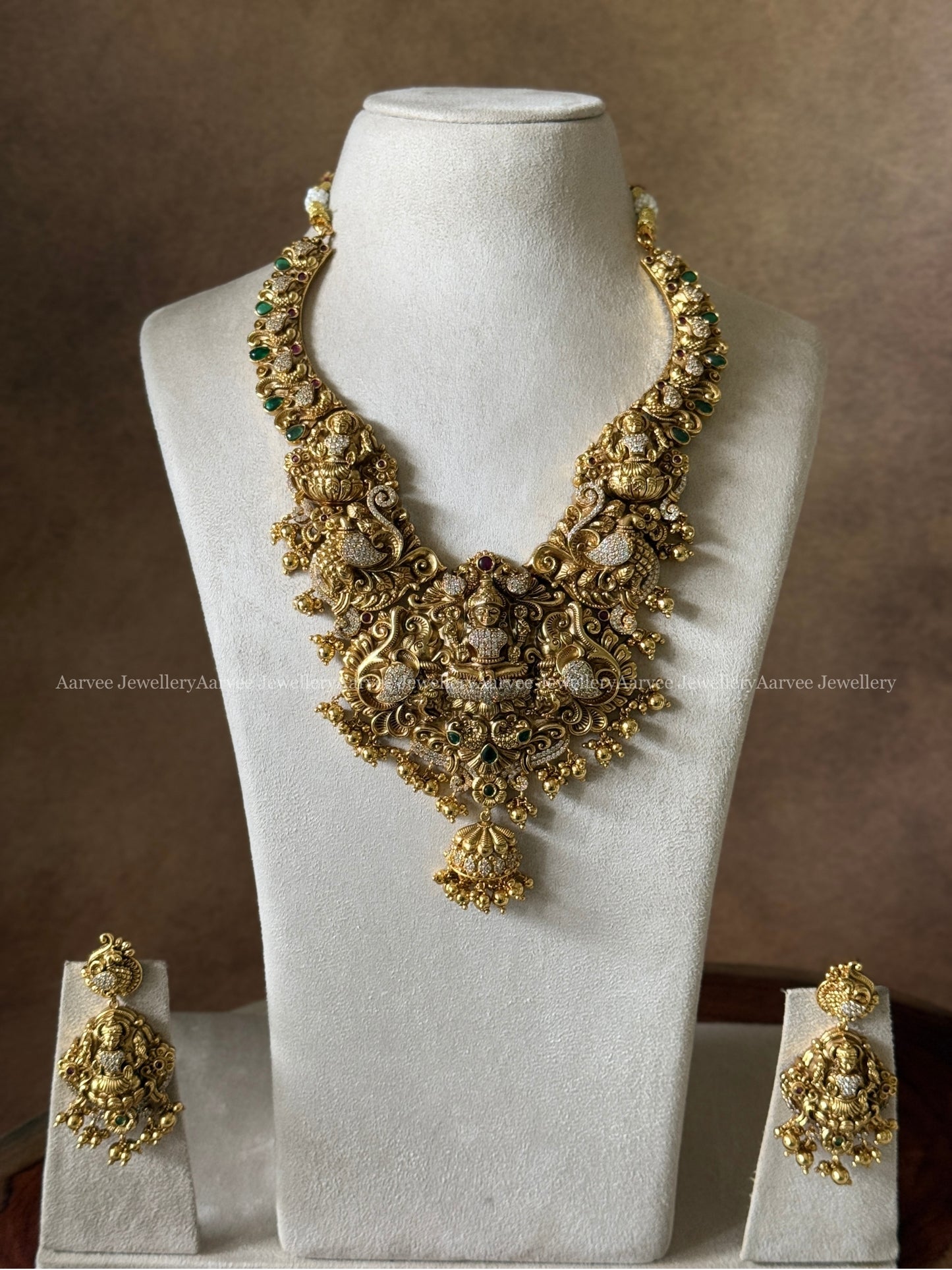 GOLD FINISH BROAD KANTI NECKLACE SET WITH LAKSHMI PENDANT
