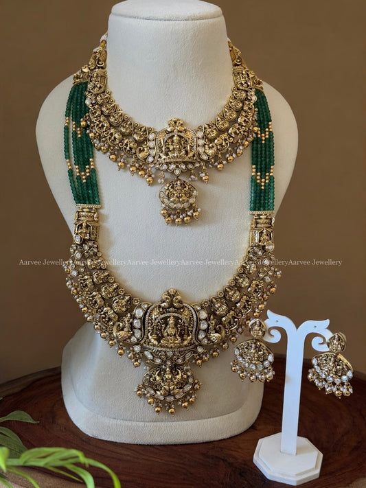 TEMPLE JEWELLERY SEMI BRIDAL SET | GREEN BEADED HAARAM WITH LAKSHMI PENDANT PAIRED WITH A FULL GOLD LAKSHMI NECKLACE IN GOLD BEADS