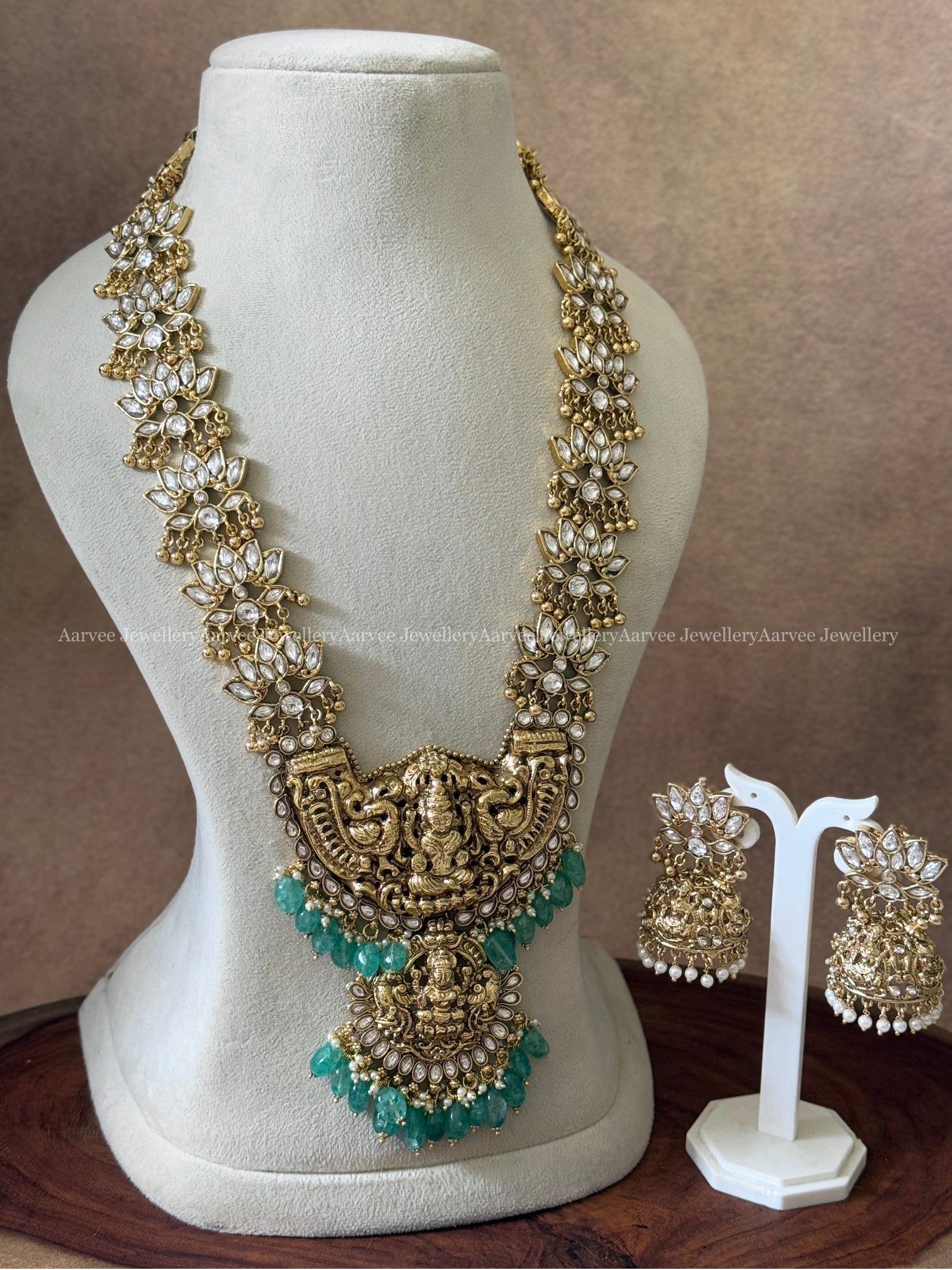 KUNDAN WHITE STONE LOTUS HARAM SET WITH GOLD TONE LAKSHMI PENDANT WITH PASTEL BEADS
