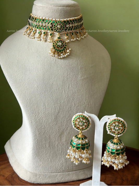 GREEN STONE CHOKER SET PAIRED WITH A BIG SIZED BUTTA JHUMKI WITH PEARLS