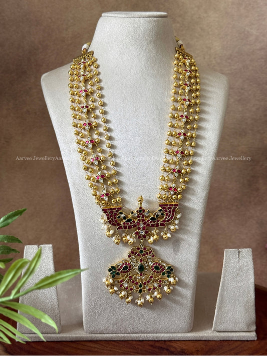 JADAU KUNDAN GOLD BEADED LAYERED MID LENGTH HARAM WITH PEACOCK PENDANT