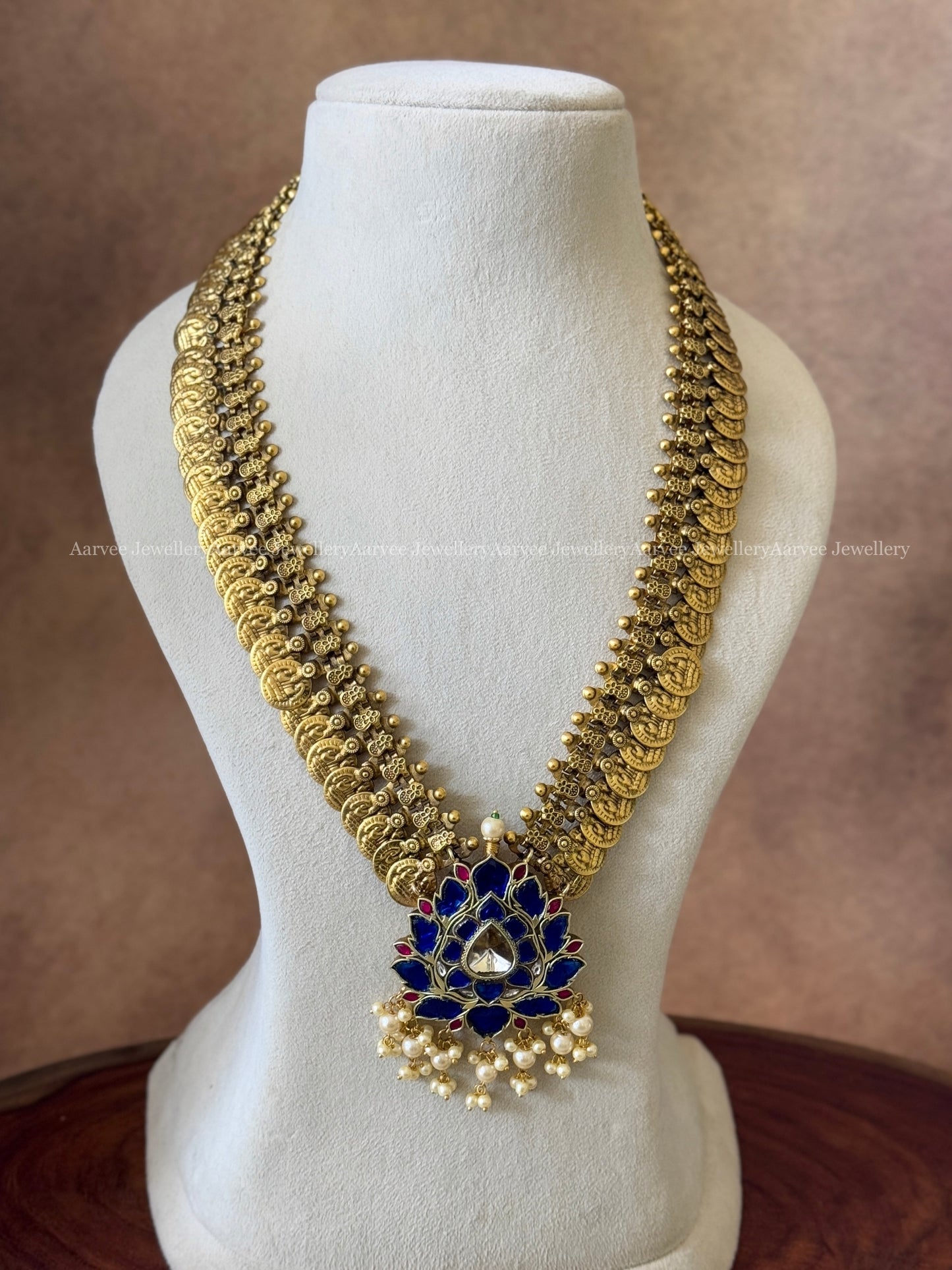 JADAU KUNDAN MID LENGTH COIN CHAIN WITH BLUE STONE LOTUS PENDANT