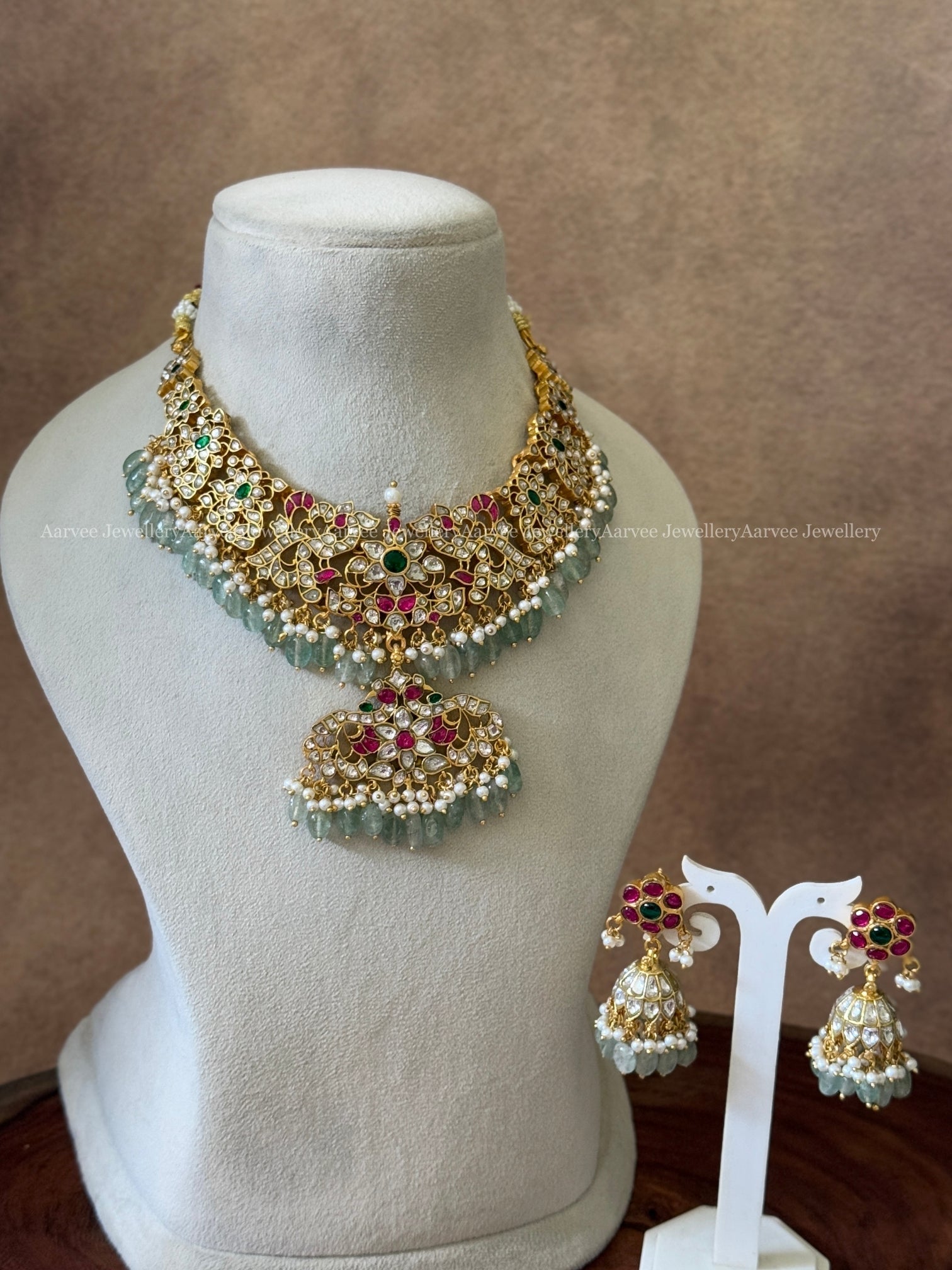 JADAU KUNDAN FLORAL NECKLACE SET WITH PASTEL BLUE BEADS
