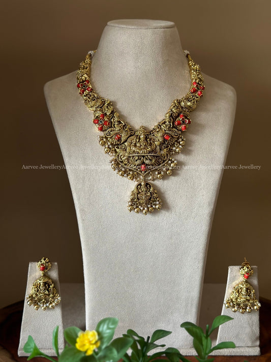 GOLD FINISH KANTI MODEL NAGAS NECKLACE SET WITH CORAL STONE