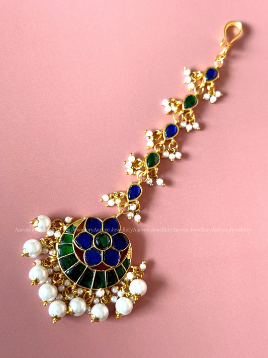 JADAU KUNDAN HALF MOON DESIGN TIKKA WITH BLUE / GREEN STONES WITH PEARLS
