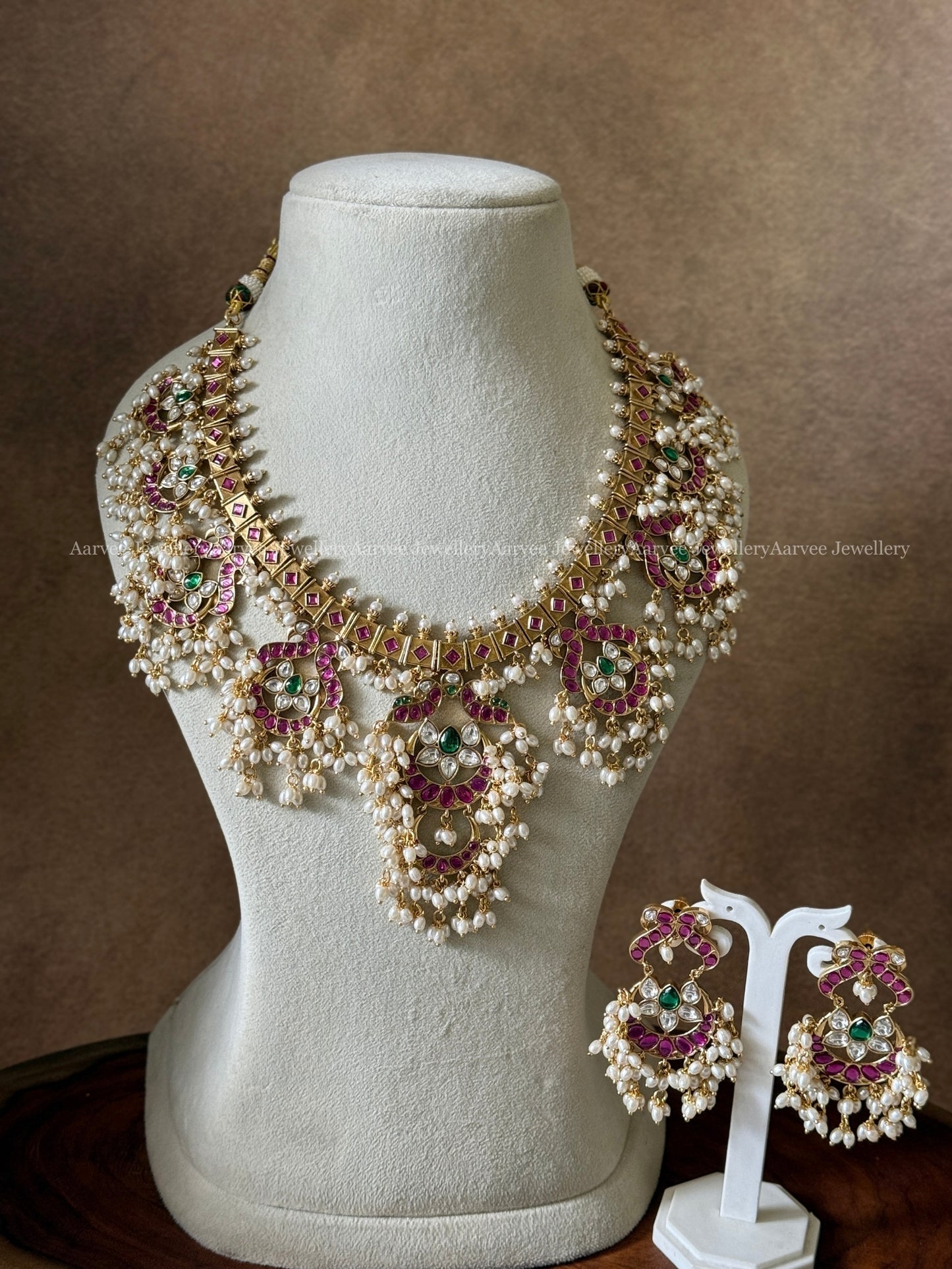 PREMIUM ANTIQUE GOLD FINISH FLORAL GUTTA PUSALU NECKLACE SET WITH RUBY / GREEN KUNDAN STONE & PEARLS