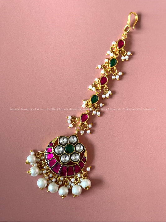 JADAU KUNDAN HALF MOON DESIGN TIKKA WITH PINK / GREEN / WHITE STONES WITH PEARLS