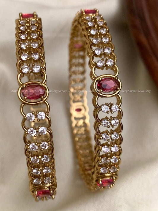 GOLD TONE DESIGNER BANGLE WITH RUBY STONE