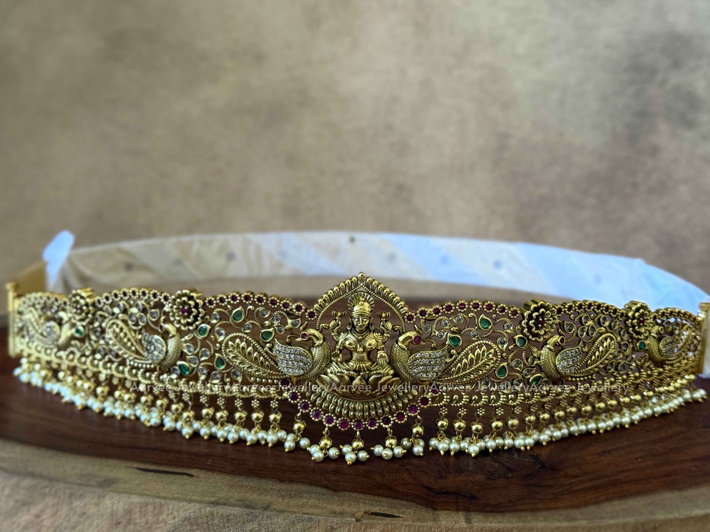 GOLD FINISH LAKSHMI & PEACOCK MOTIF WAIST BELT