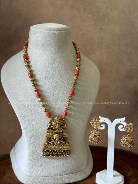 GOLD AND CORAL BEADED MID LENGTH CHAIN SET WITH LAKSHMI PENDANT