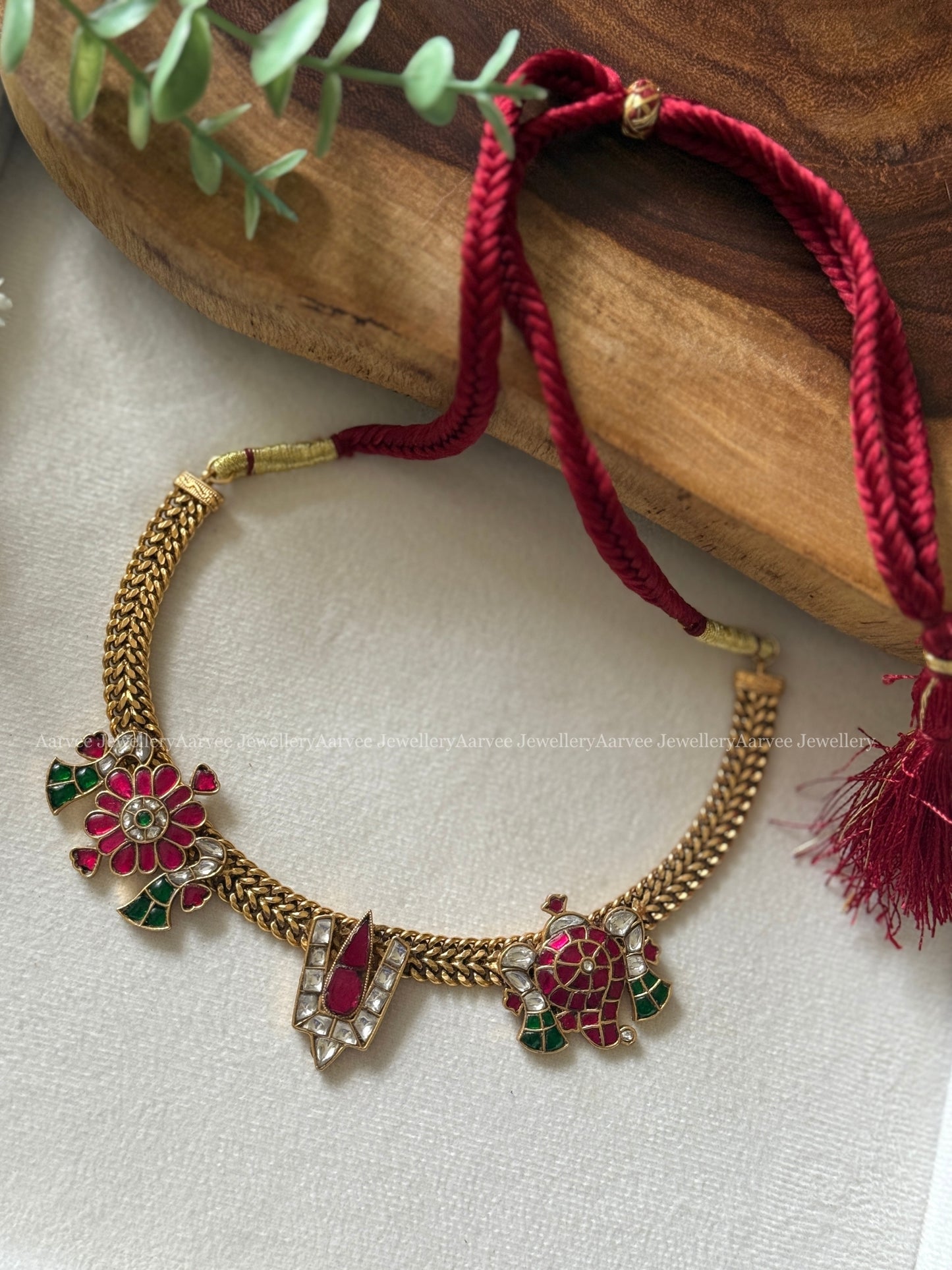 PREMIUM JALEBI NECKLACE SET WITH NAMA AND FLORAL PENDANT WITH RUBY / GREEN KUNDAN STONES