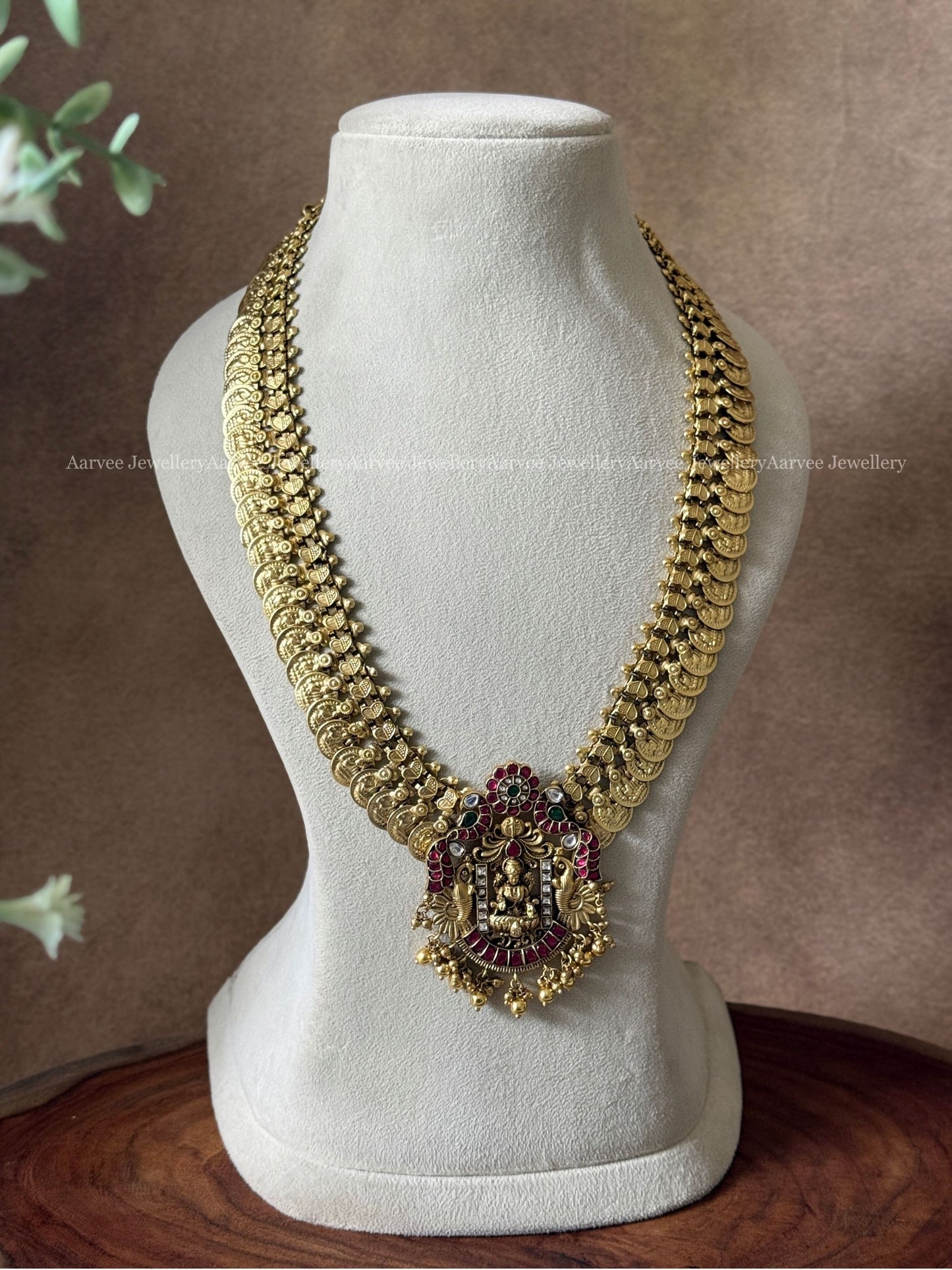 JADAU KUNDAN COIN MID LENGTH CHAIN WITH LAKSHMI PEACOCK PENDANT AND GOLD BEADS