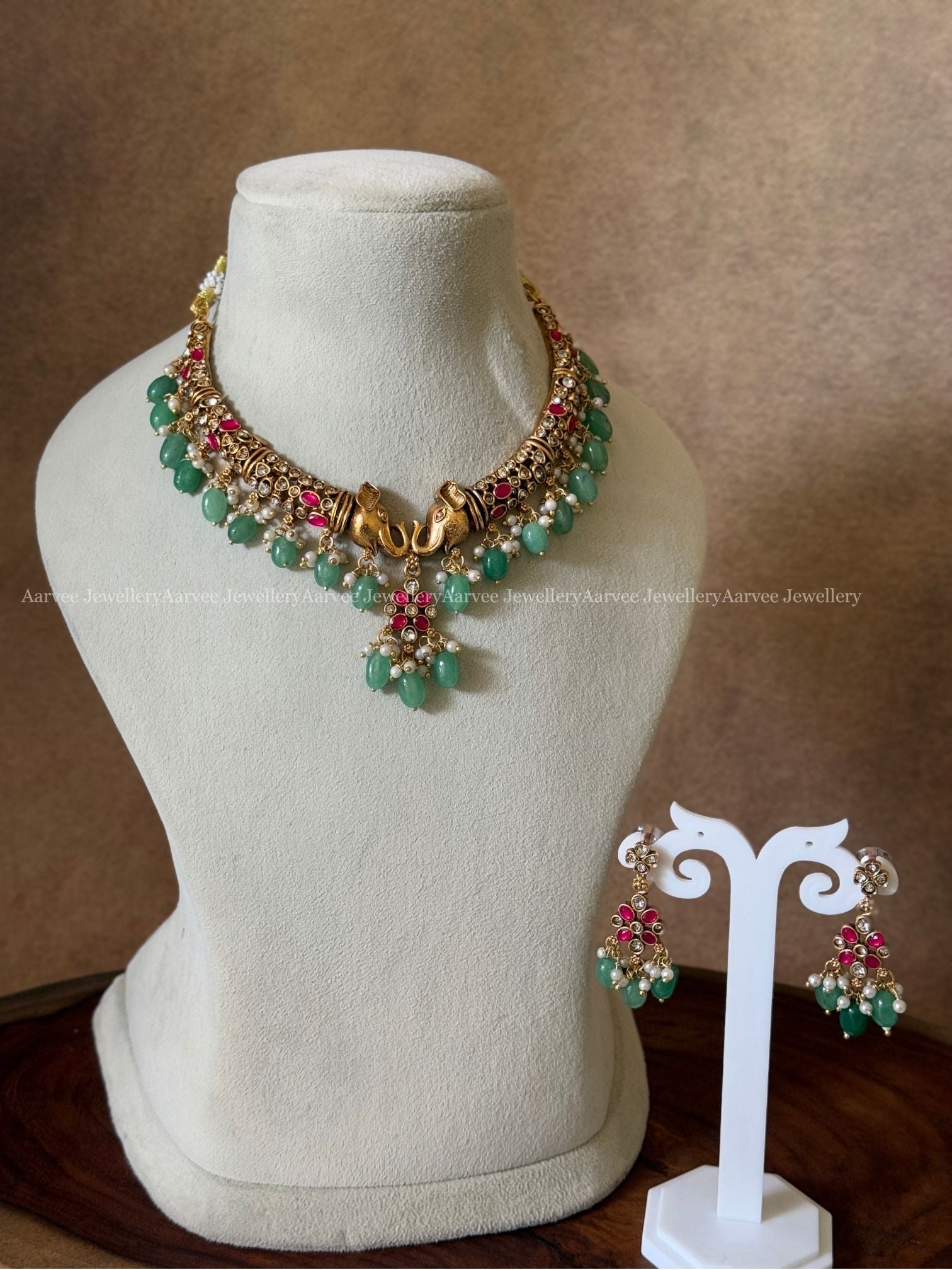 ELEPHANT KANTI NECKLACE SET WITH RUBY STONE AND PASTEL BEADS
