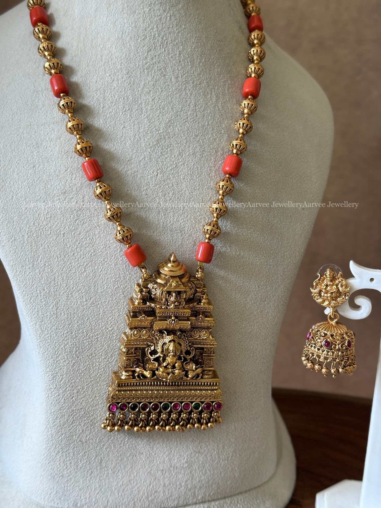 GOLD AND CORAL BEADED MID LENGTH CHAIN SET WITH LAKSHMI PENDANT
