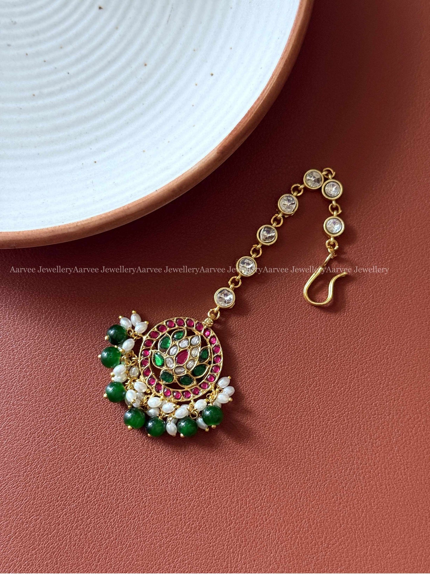 JADAU KUNDAN MULTI COLOR LOTUS TIKKA WITH GREEN BEADS