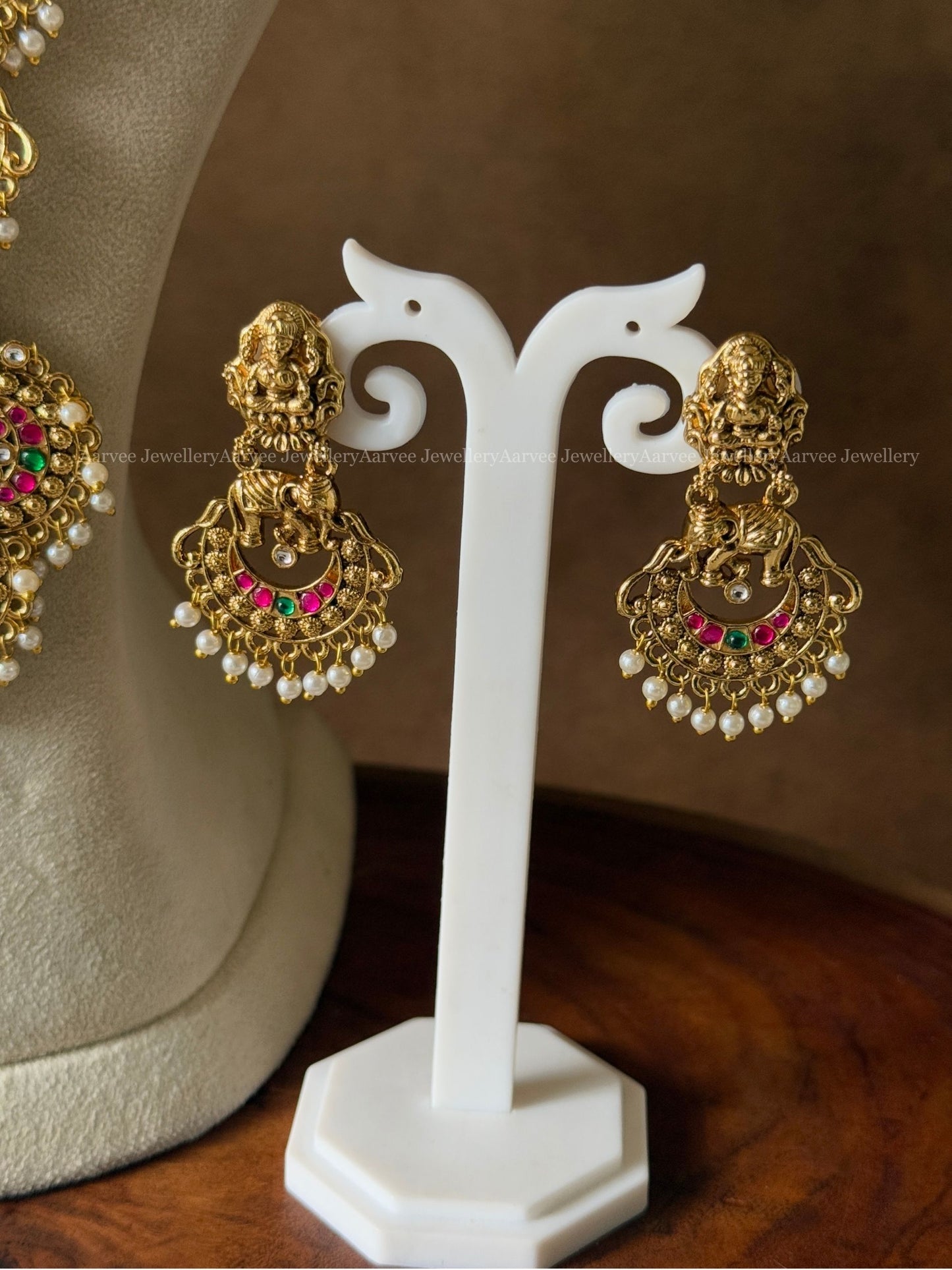 FULL GOLD TONE LAKSHMI MOTIF & KUNDAN STONES HARAM SET