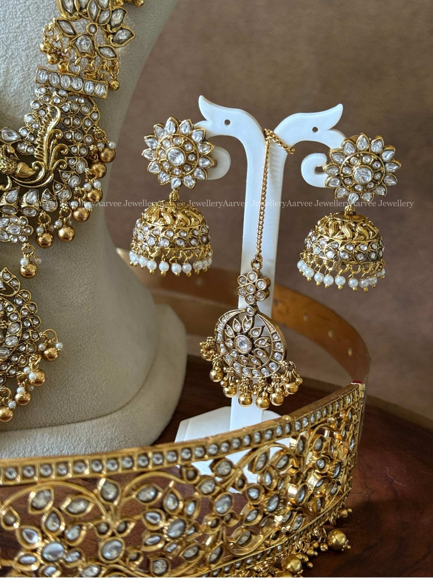 AN EXQUISITE WHITE KUNDAN STONES  LOTUS & LAKSHMI  BRIDAL JEWELLERY