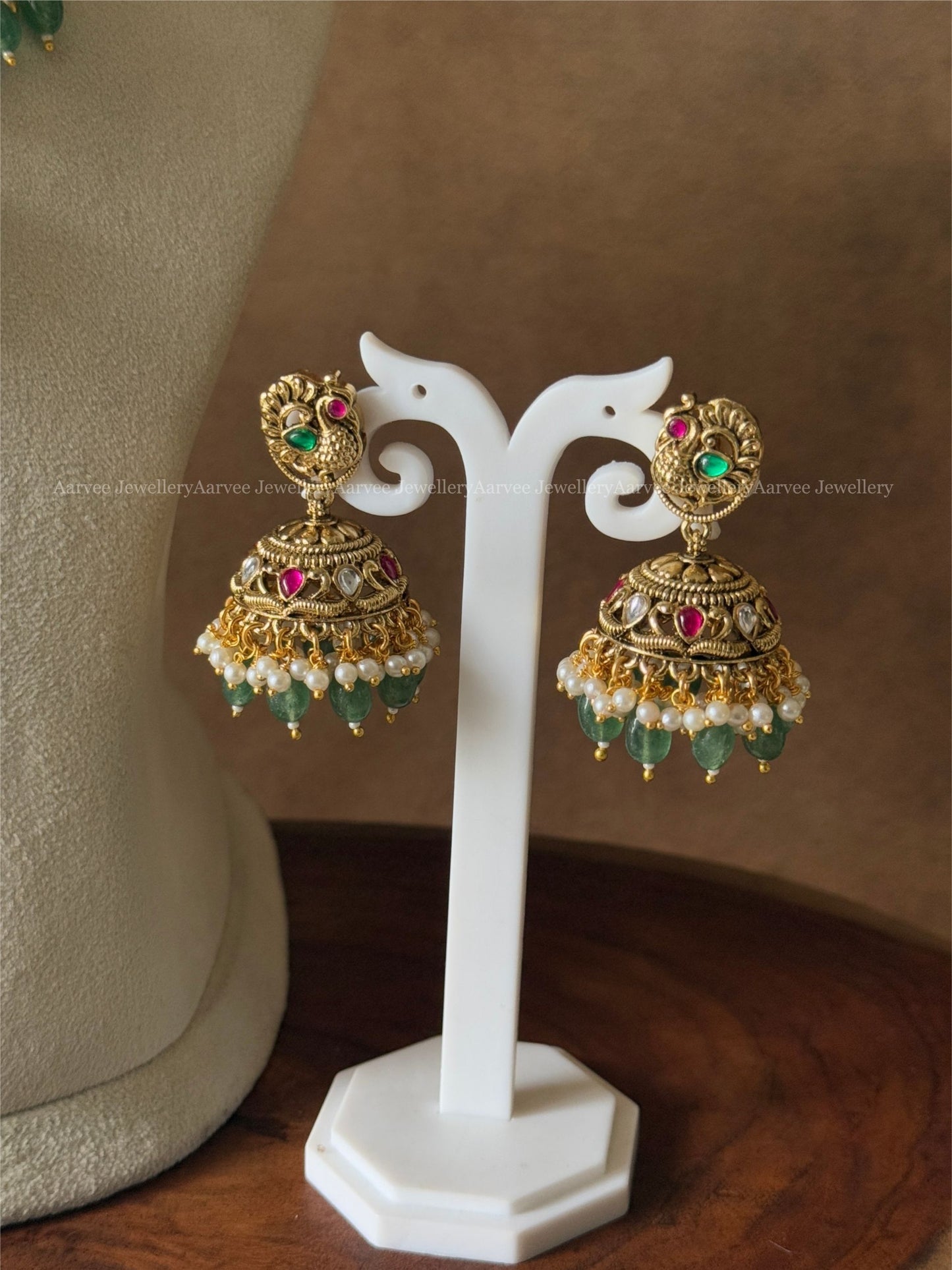 GOLD TONE PINK KUNDAN STONE PEACOCK MOTIF KANTI NECKLACE SET WITH GREEN BEADS