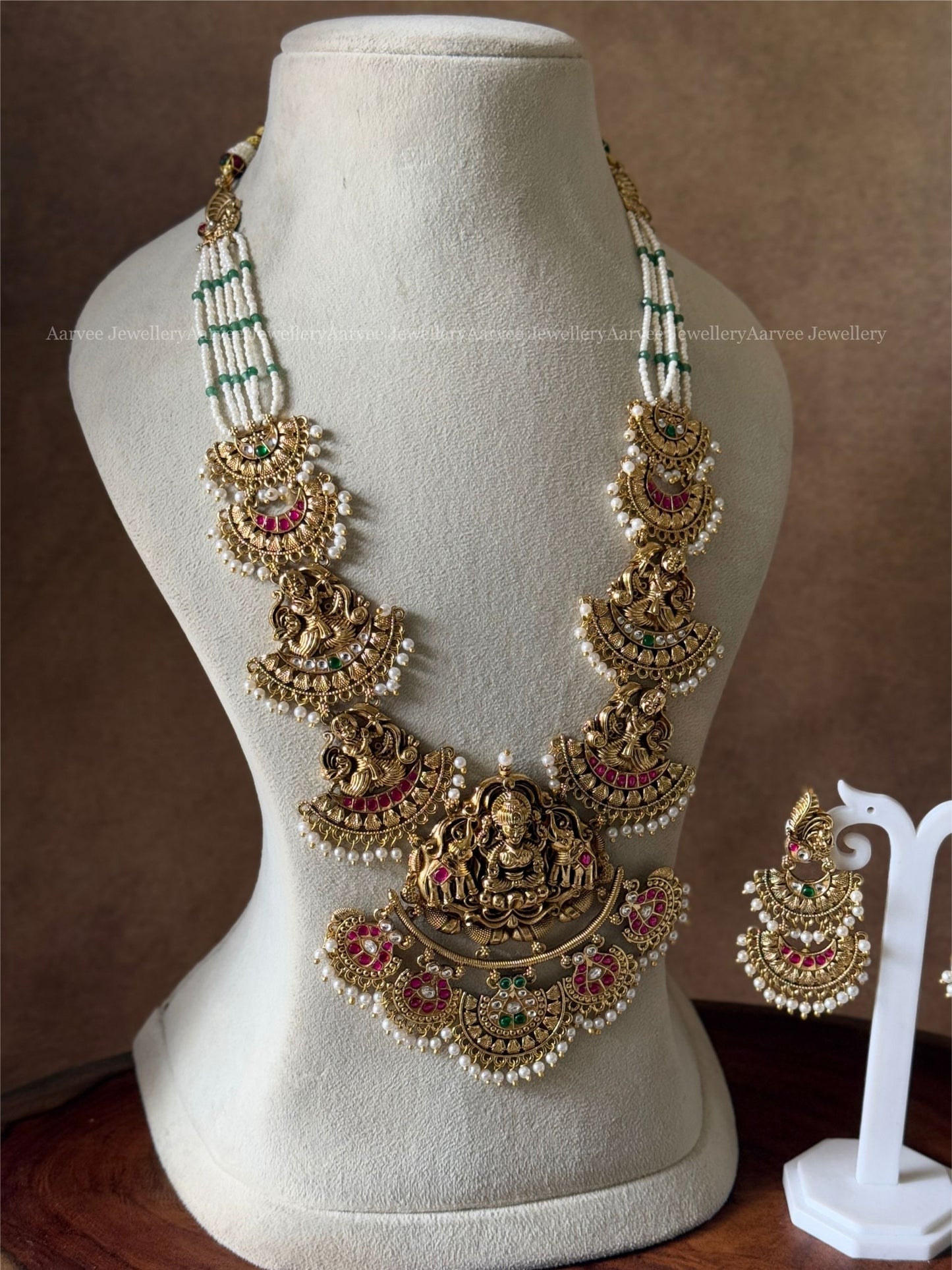 PREMIUM PEARL BEADED KUNDAN STONE LAKSHMI , ELEPHANT MOTIF HARAM SET