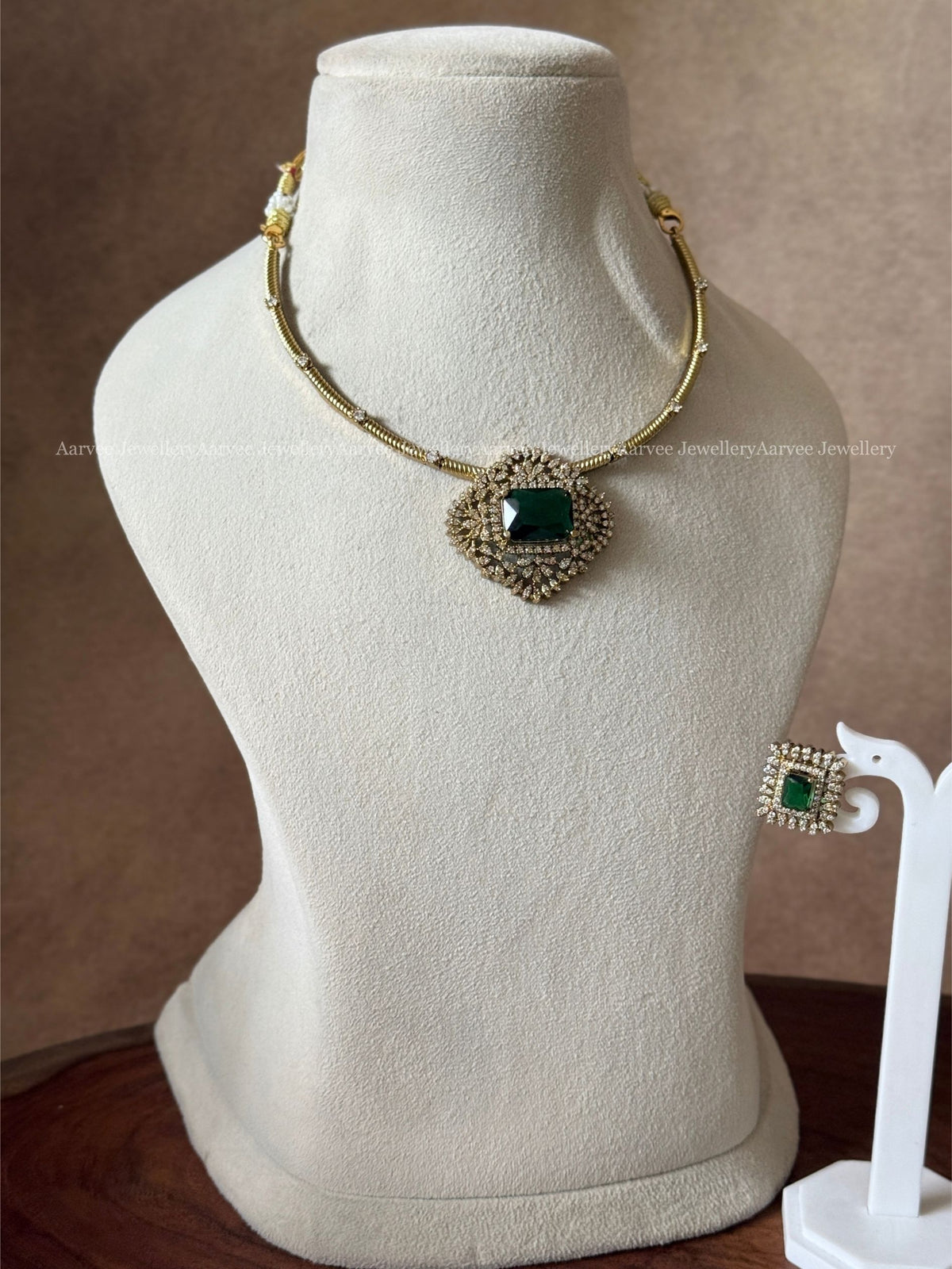 GOLD TONE KANTI NECKLACE SET WITH GREEN STONE CZ PENDANT