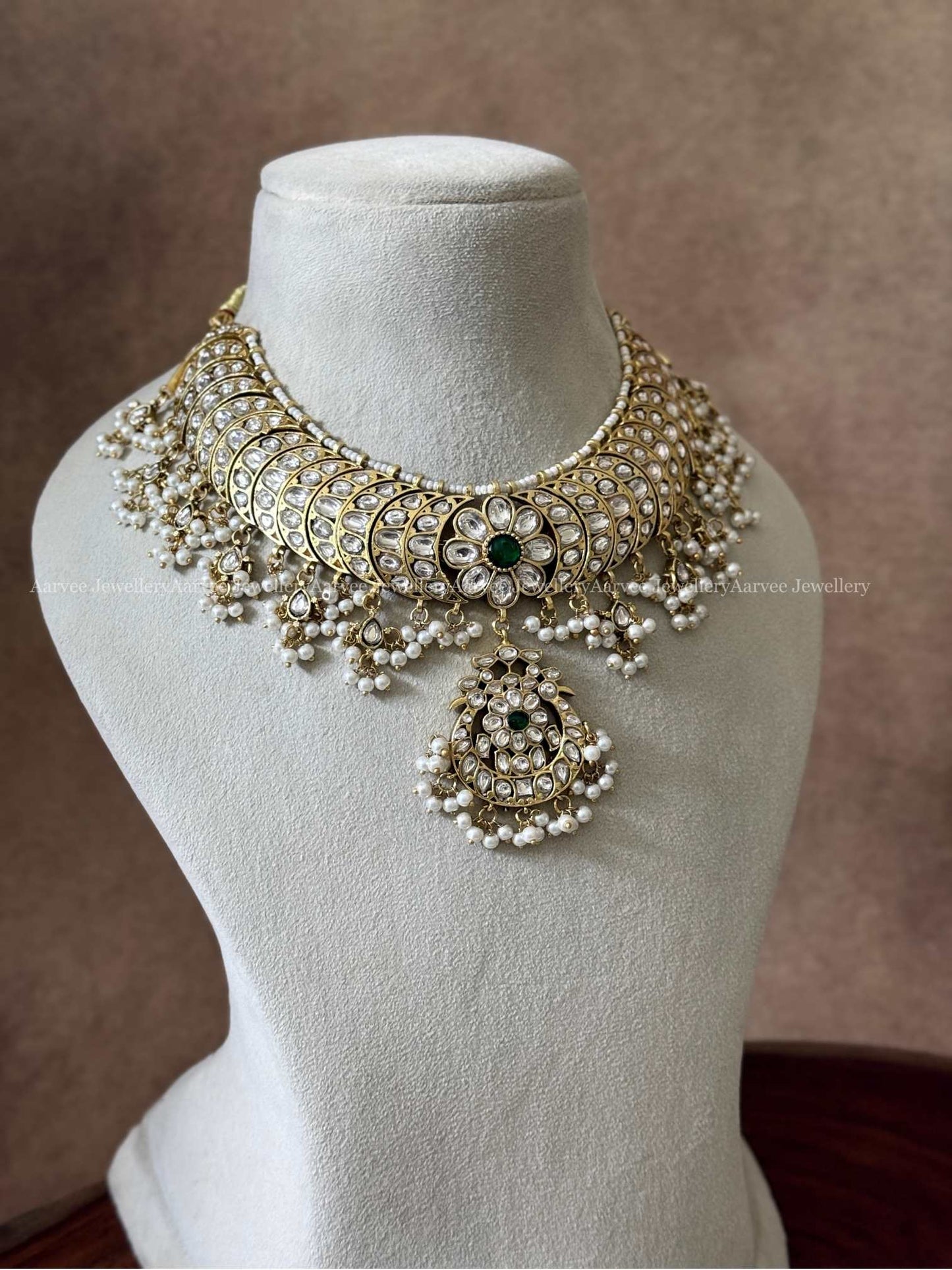 JADAU KUNDAN WHITE STONE CRESCENT NECKLACE WITH FLORAL PENDANT AND WHITE STONE DROPS