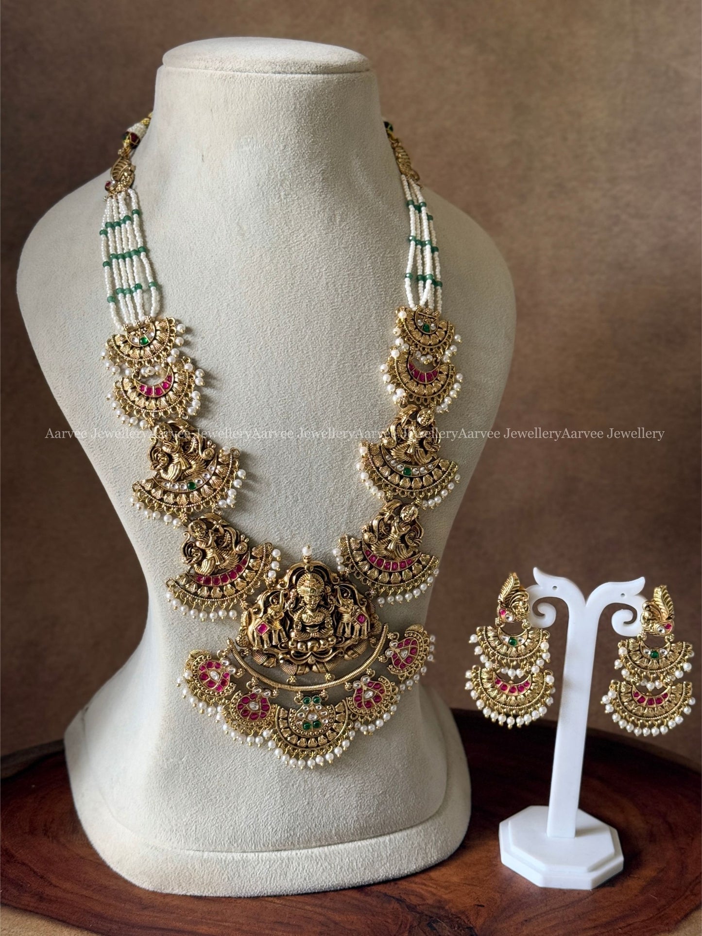 PREMIUM PEARL BEADED KUNDAN STONE LAKSHMI , ELEPHANT MOTIF HARAM SET