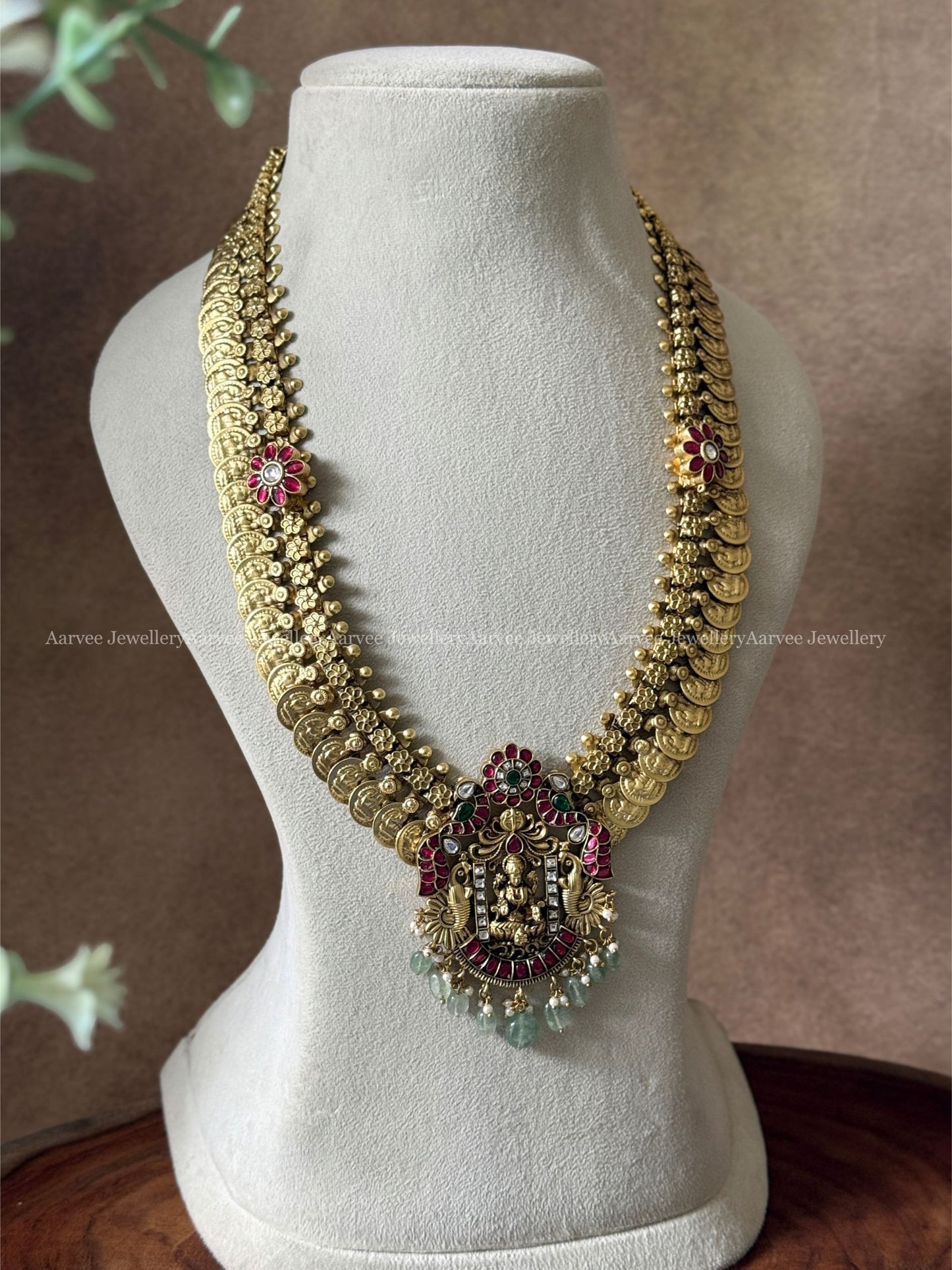 JADAU KUNDAN COIN MID LENGTH CHAIN WITH LAKSHMI PEACOCK PENDANT AND PASTEL BEADS