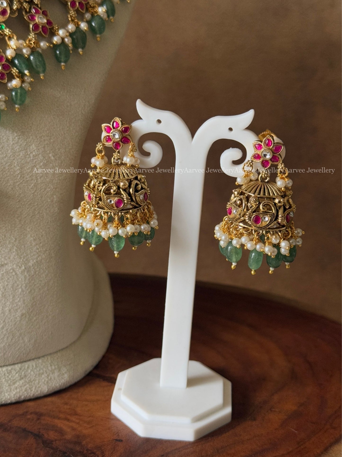 GOLD TONE LAKSHMI & KUNDAN STONE FLORAL MOTIF STATEMENT NECKLACE SET WITH PASTEL BEADS