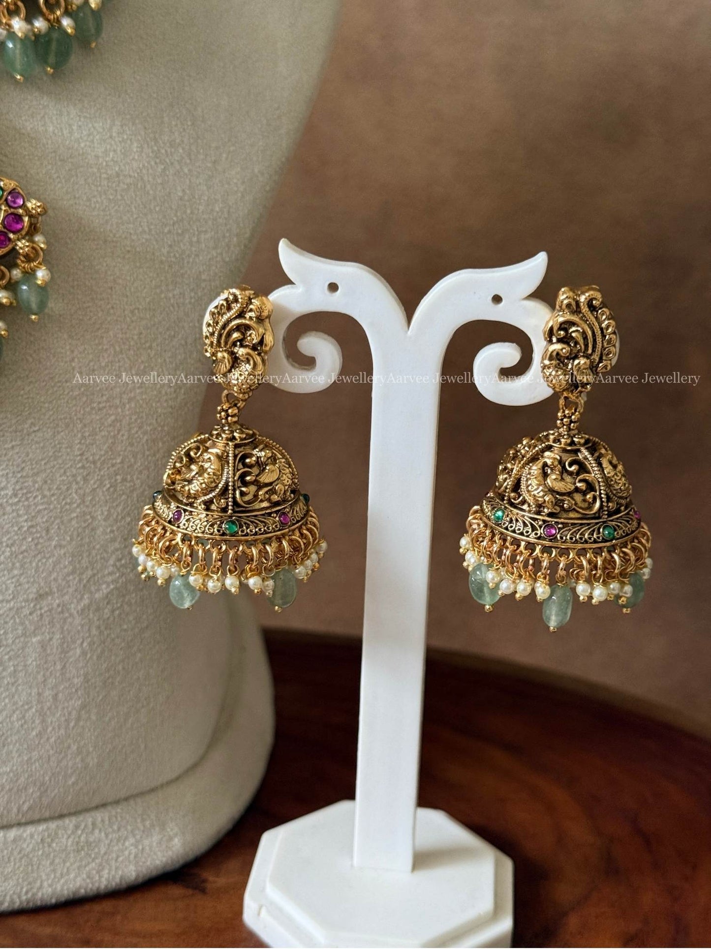 NON IDOL KANTI DESIGN PEACOCK MOTIF NECKLACE SET WITH KUNDAN RUBY/GREEN/WHITE STONES & PASTEL BEADS