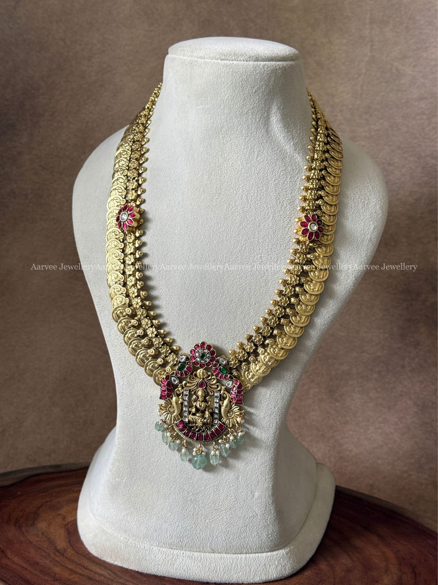 JADAU KUNDAN COIN MID LENGTH CHAIN WITH LAKSHMI PEACOCK PENDANT AND PASTEL BEADS