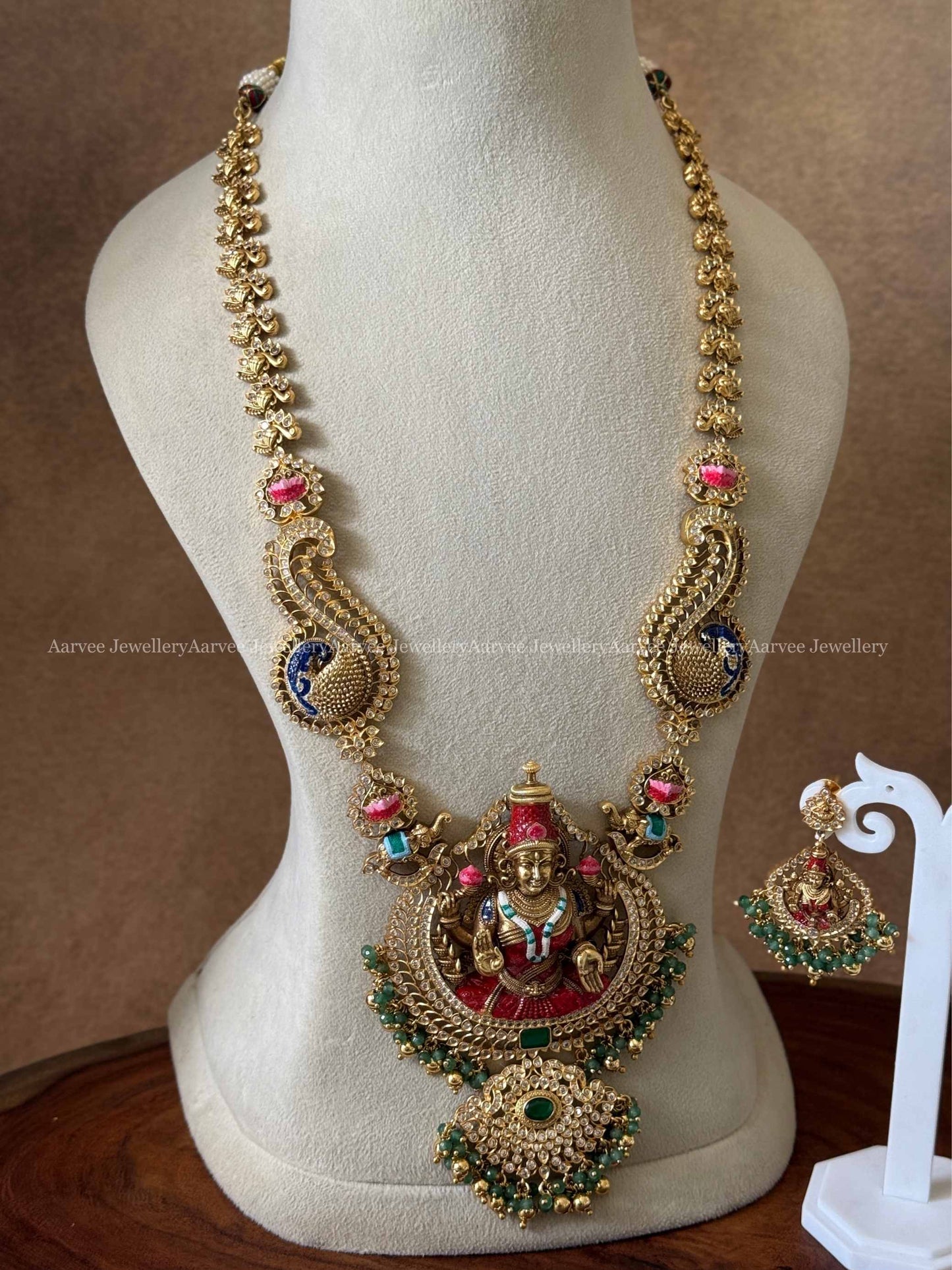 GOLD TONE LAKSHMI HARAM SET WITH GOLD AND GREEN BEADS