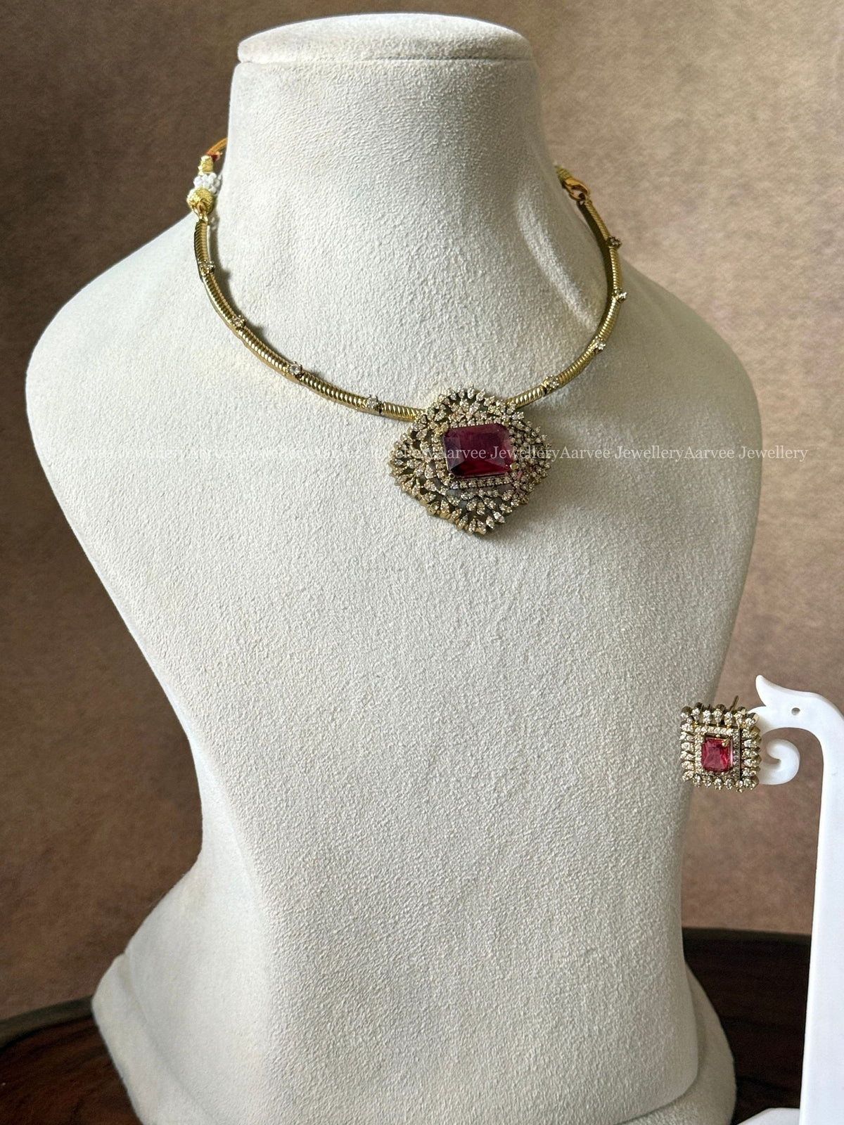 GOLD TONE KANTI NECKLACE SET WITH RED STONE CZ PENDANT