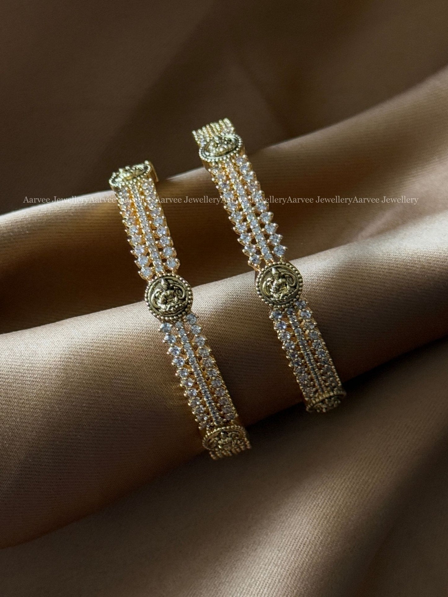 WHITE AD STONE AND LAKSHMI MOTIF BANGLES