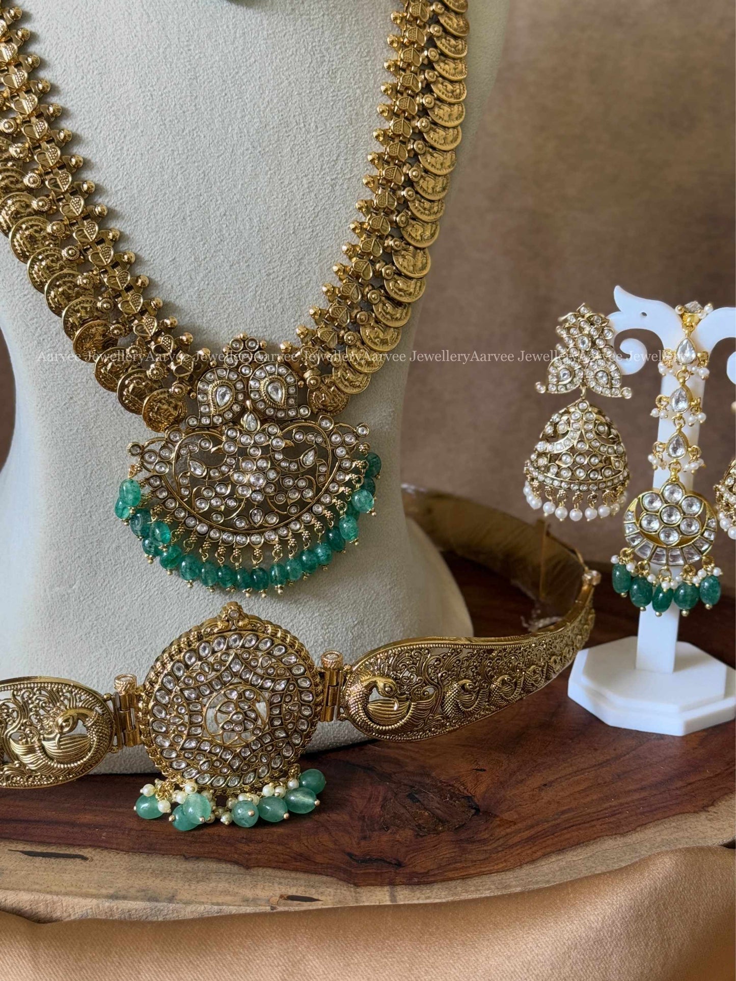 KUNDAN BRIDAL JEWELLERY - GREEN STONE KANTI NECKLACE, COIN HARAM SET, WAIST BELT AND TIKKA WITH PASTEL GREEN BEADS