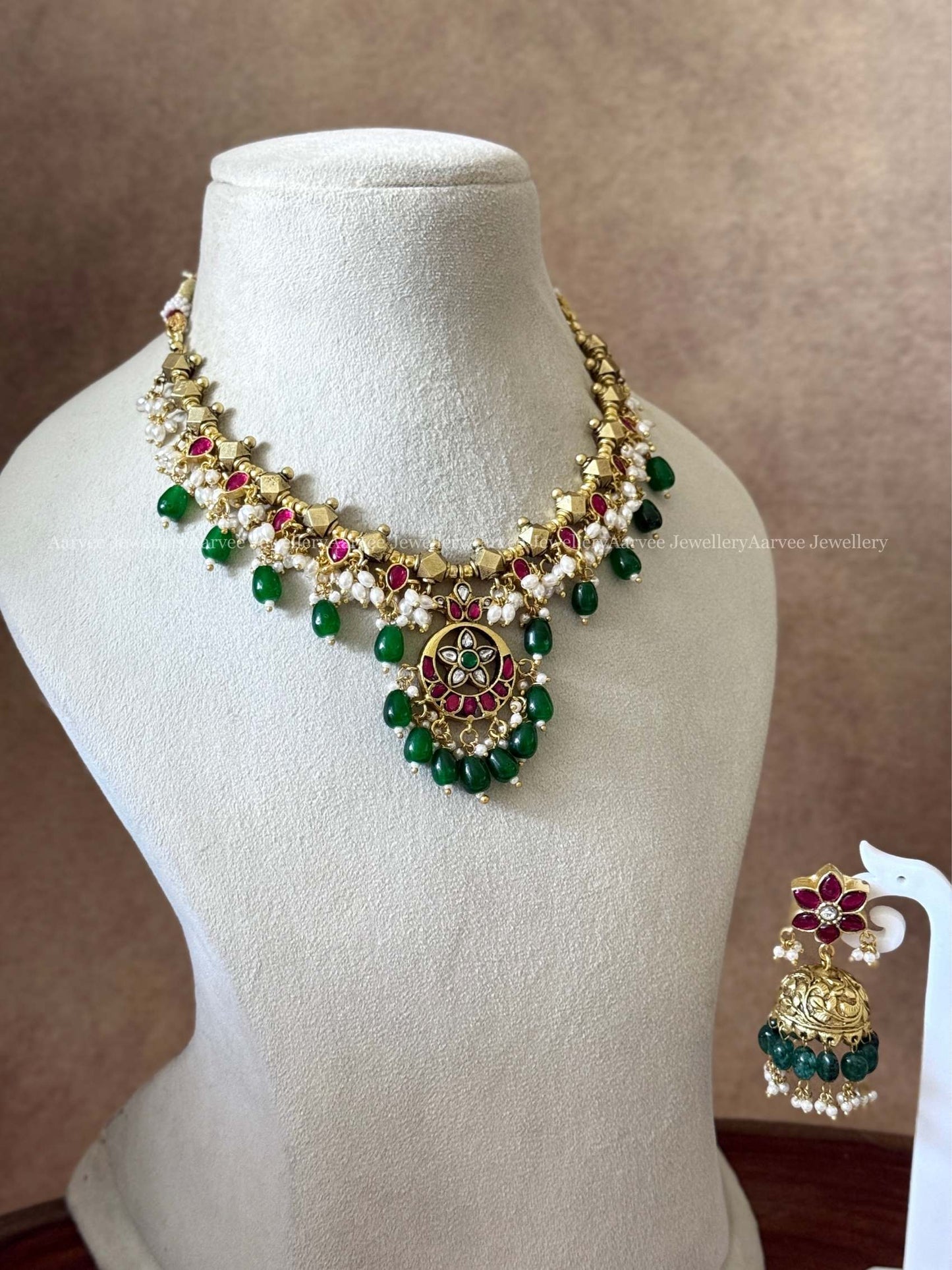 JADAU KUNDAN GOLD BALL BEADED NECKLACE WITH FLORAL JHUMKI IN GREEN BEADS