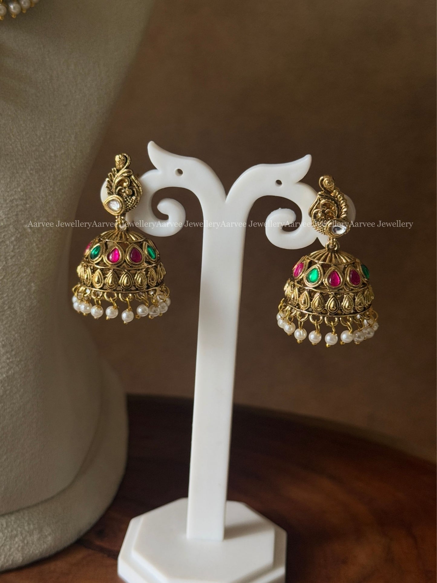 GOLD TONE LAKSHMI MOTIF STATEMENT NECKLACE SET WITH MULTI COLORS KUNDAN STONES