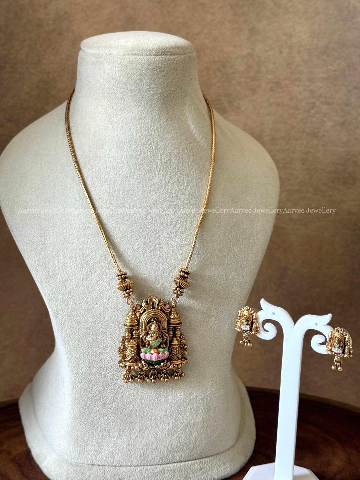 PLAIN MID LENGTH GOLD CHAIN WITH SARASWATI PENDANT SET