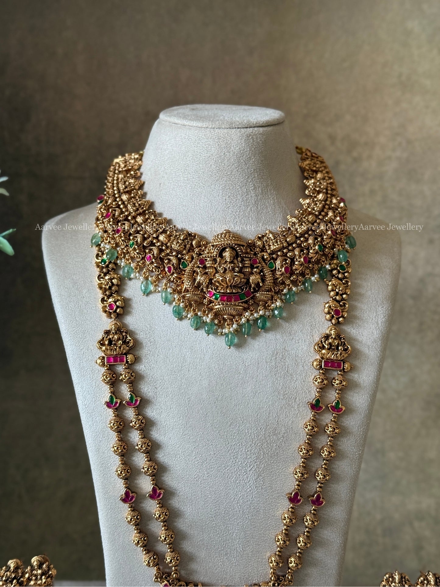 TEMPLE BRIDAL JEWELLERY FULL GOLD LAKSHMI NECKLACE AND GOLD BALL BEADED HARAM SET WITH PASTEL BEADS