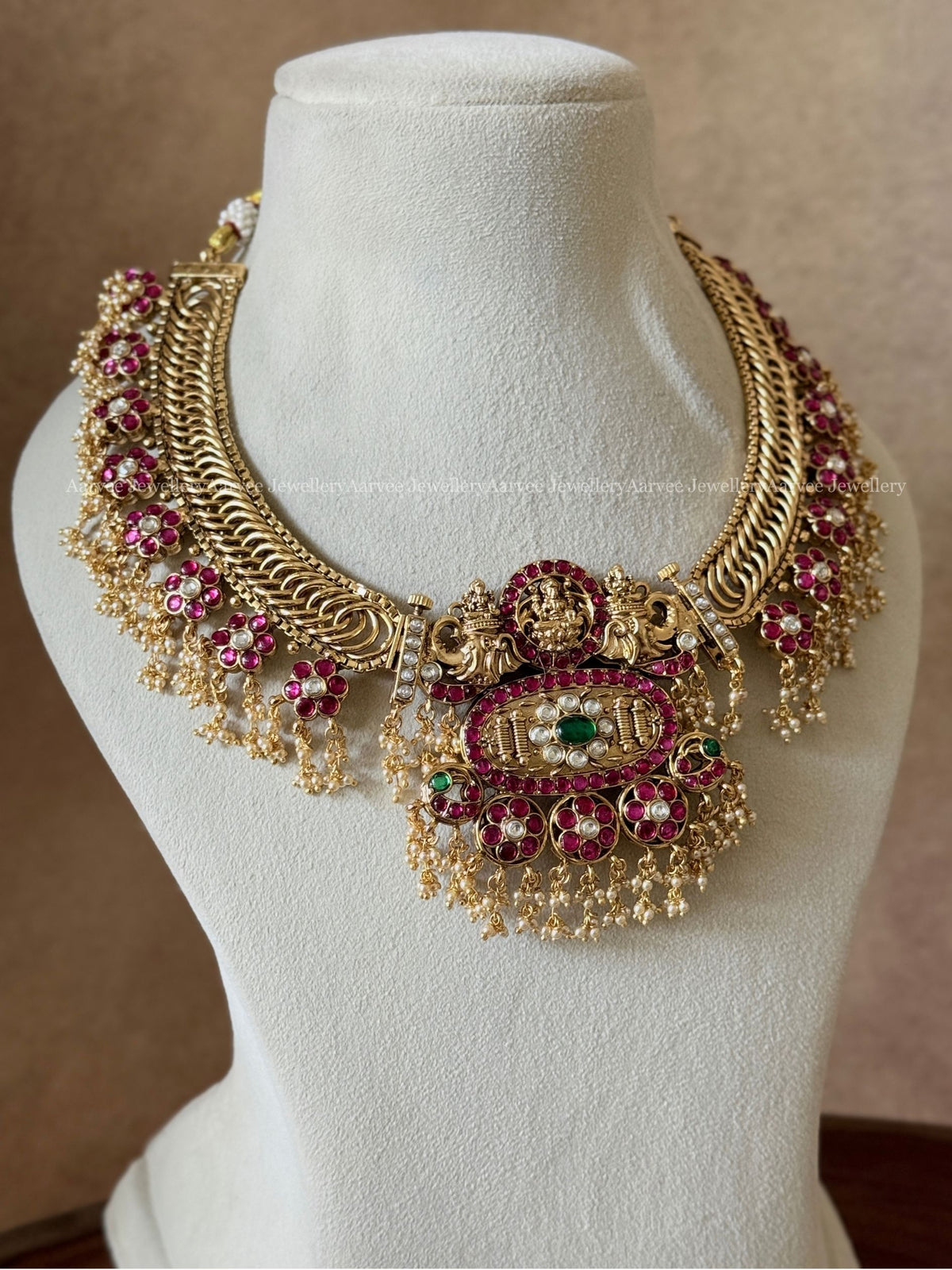 JADAU KUNDAN REVERSIBLE JALEBI NECKLACE SET WITH LAKSHMI FLORAL PENDANT