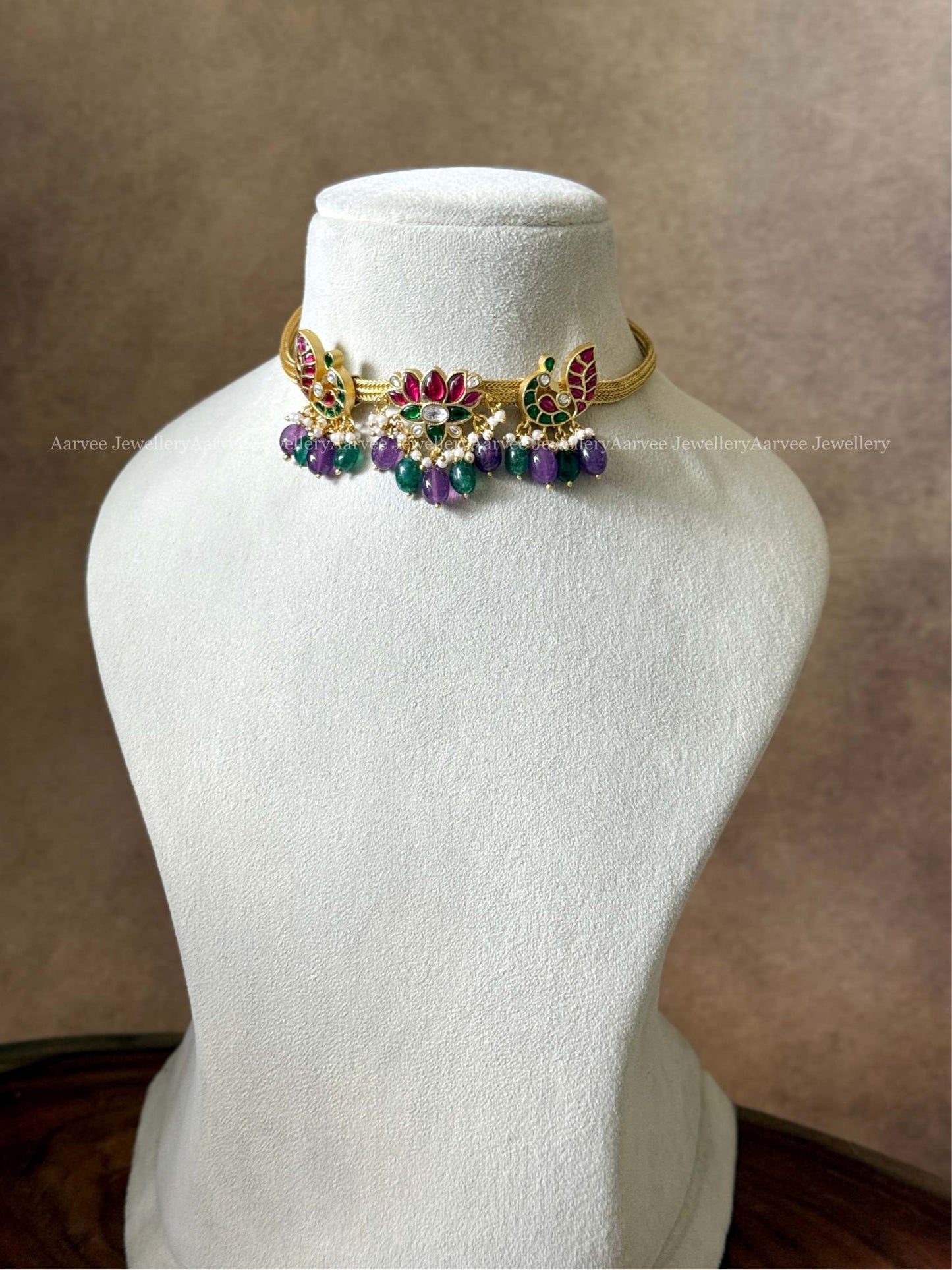 JADAU KUNDAN ANNAM & LOTUS MOTIF NECKLACE WITH GREEN / PURPLE BEADS