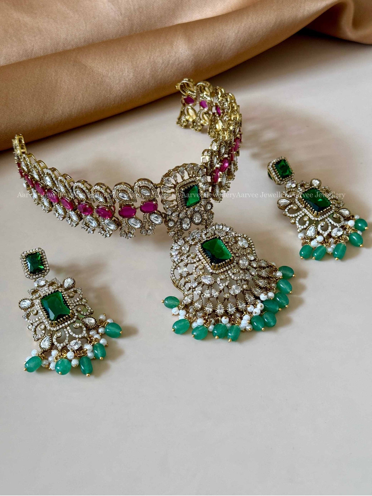 PREMIUM VICTORIAN BRIDAL CHOKER SET WITH PINK/ WHITE STONES AND GREEN BEADS