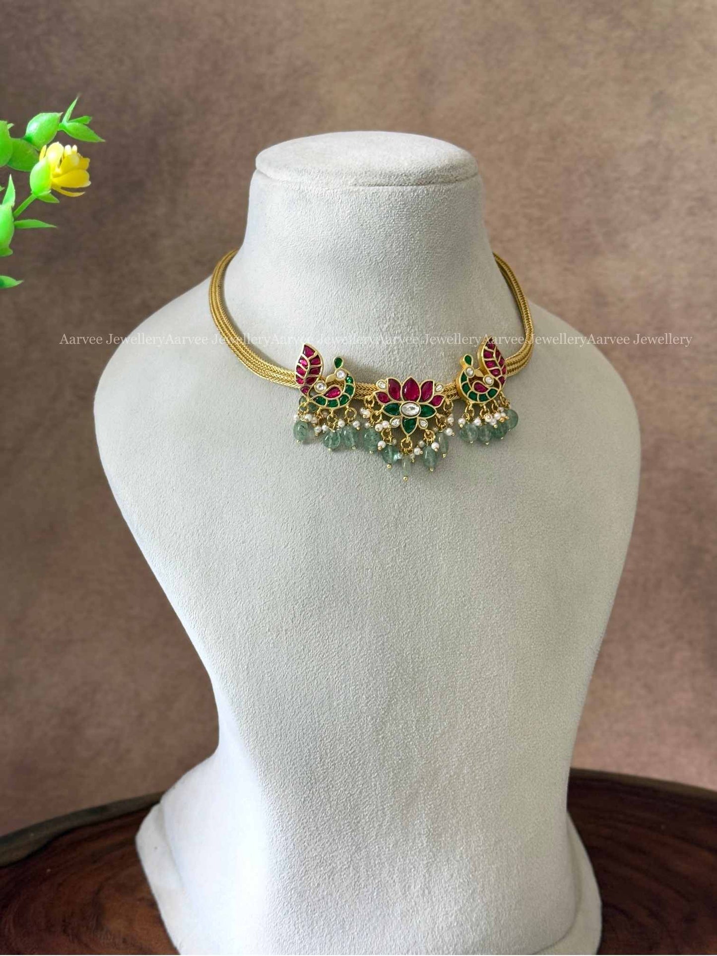 JADAU KUNDAN ANNAM AND LOTUS MOTIF NECKLACE WITH PASTEL BEADS