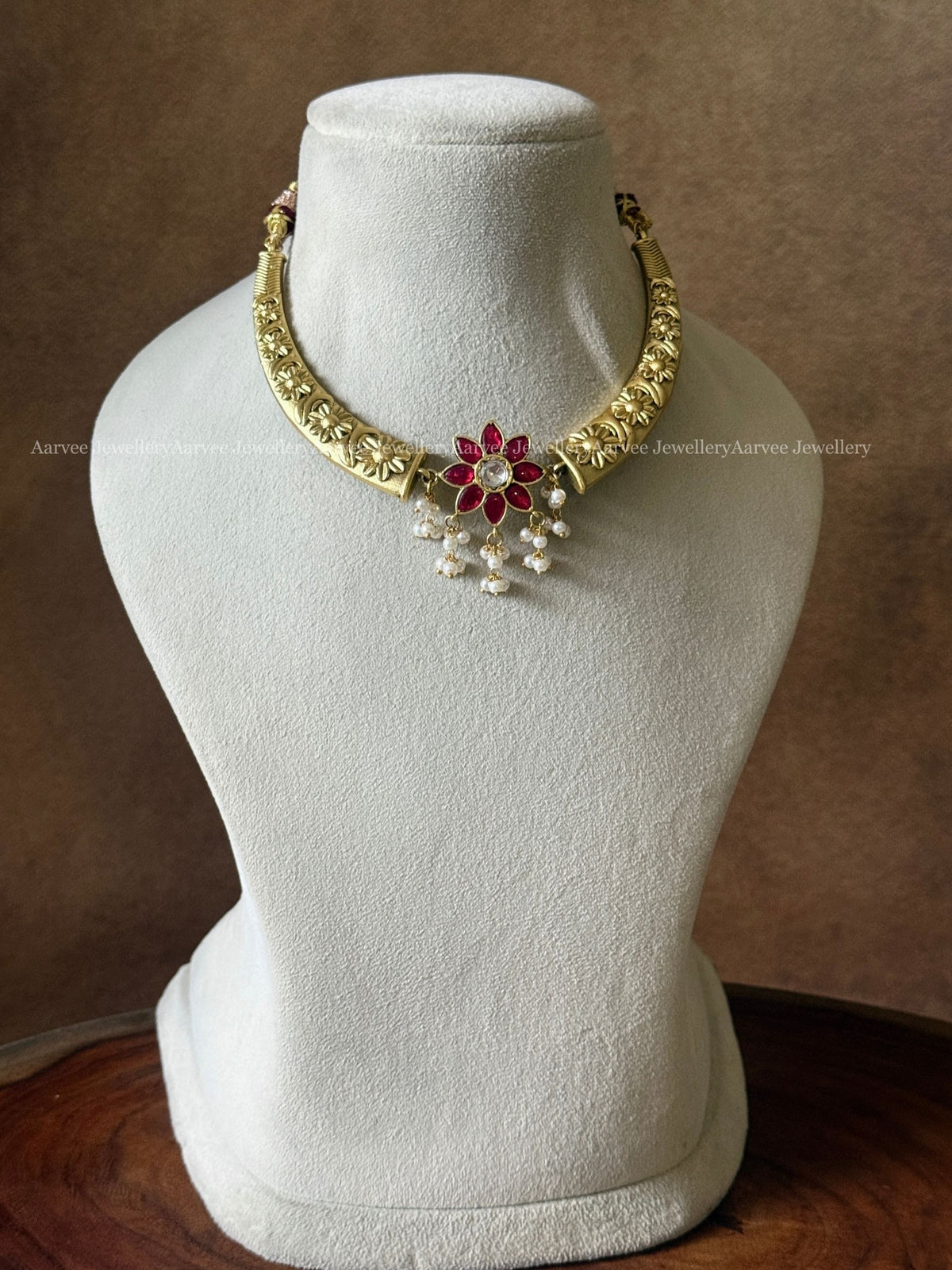 JADAU KUNDAN GOLD TONE KANTI NECKLACE WITH RUBY STONE FLORAL PENDANT